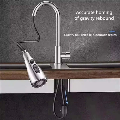 Stainless Steel Pull-Out Faucet installed in a modern kitchen sink with automated gravity return feature.