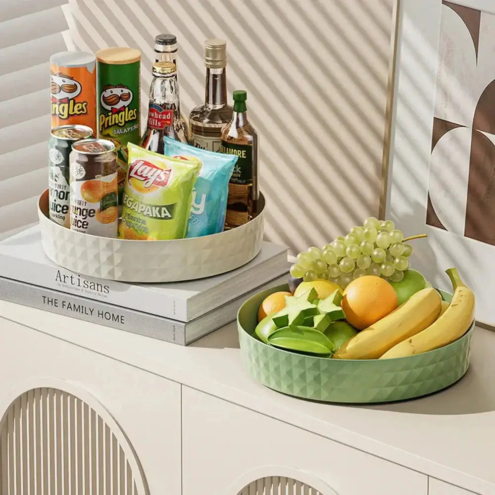 360-degree spice organizer displaying snacks and fruits in stylish storage racks on a modern table.