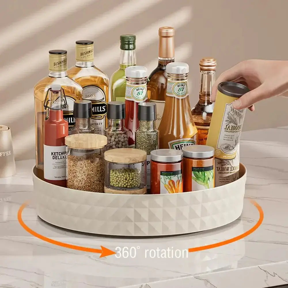 360-degree spice organizer showcasing 360-degree rotation with various spice bottles and containers in a cream white rack.