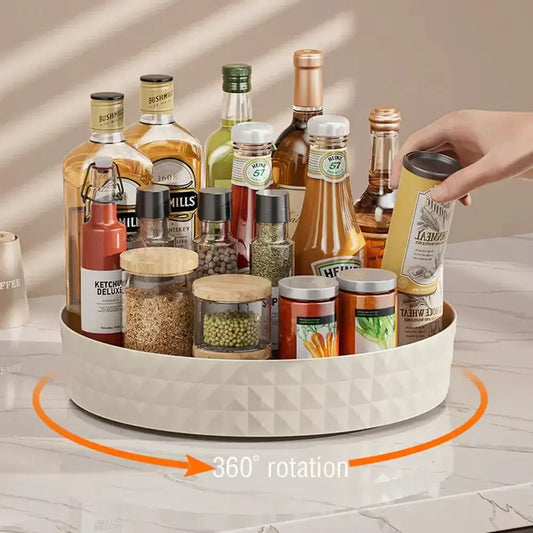360-degree spice organizer showcasing 360-degree rotation with various spice bottles and containers in a cream white rack.