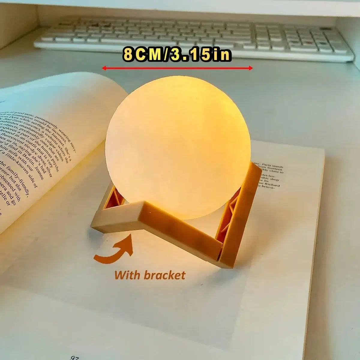 DIY Moon Light Night Kit showcasing a glowing moon lamp on a book with a bracket, perfect for cozy ambiance.