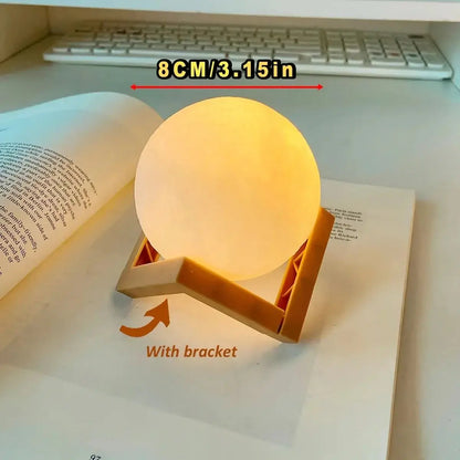 DIY Moon Light Night Kit showcasing a glowing moon lamp on a book with a bracket, perfect for cozy ambiance.